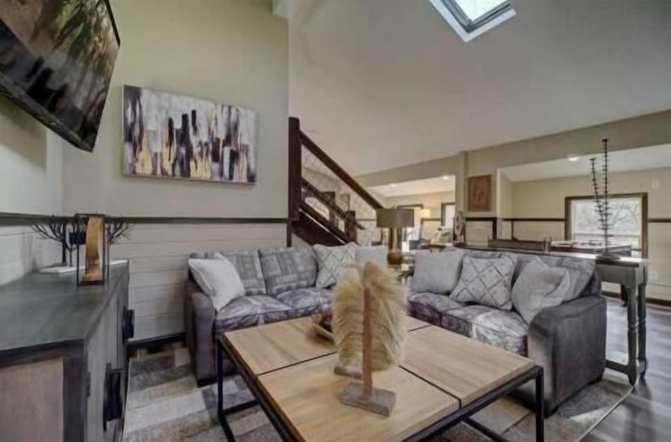 Living Room: Bright and inviting space with plush seating and modern decor for ultimate relaxation!