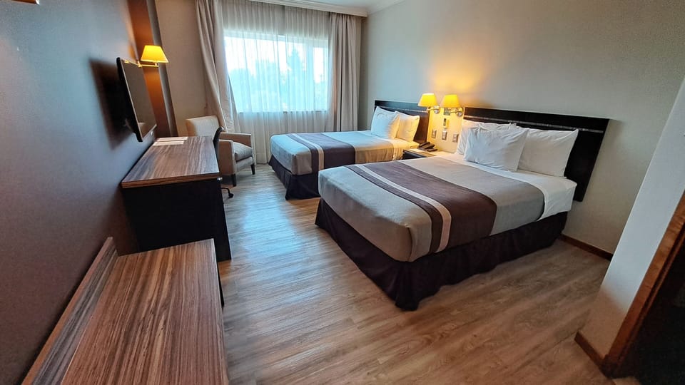 Standard Double Room | Minibar, in-room safe, desk, soundproofing