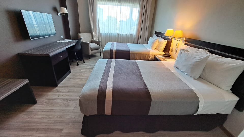 Standard Double Room | Minibar, in-room safe, desk, soundproofing