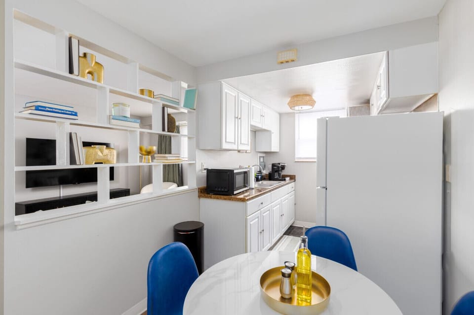 Seamlessly move between the dining area and kitchen with convenient accessibility