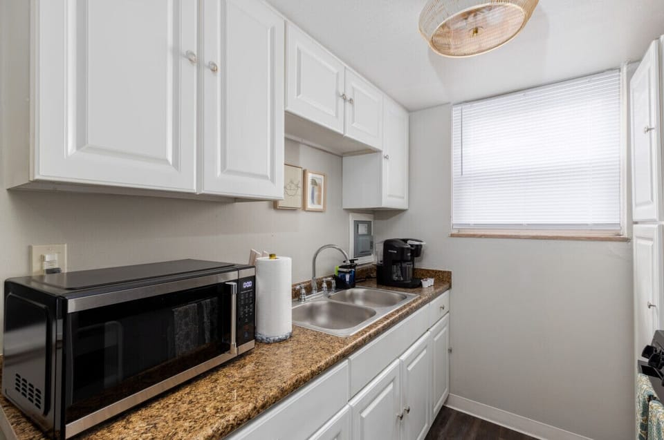 Prepare your favorite dishes in this fully equipped kitchen, furnished with all essential cooking utensils