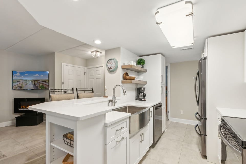 Fully Renovated Kitchen with Open Shelving, Gorgeous Quartz Countertops, and Stainless Steel Appliances