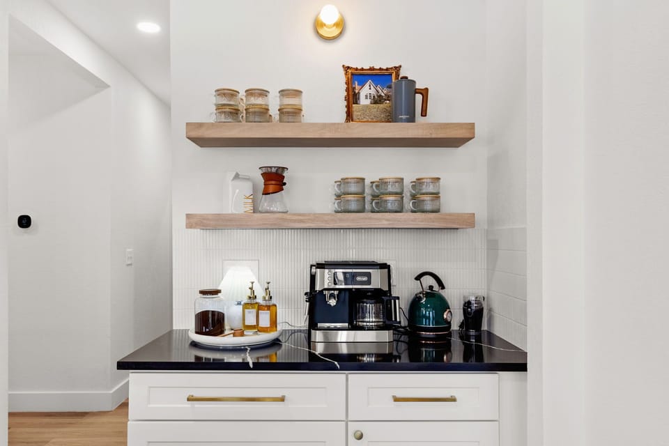 Main House | Downstairs | Kitchen | We are set up to appease the most die hard coffee fan!  We have a drip coffee machine, espresso machine, pourover coffee setup and a french press.  We also provide locally roasted coffee beans!