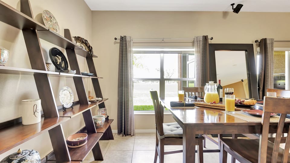 As you savor your culinary creations, bask in the abundant natural light that floods the room, creating an enchanting ambiance for your dining pleasure.