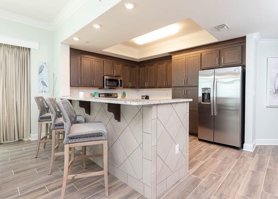 Condo, 4 Bedrooms | Private kitchen | Fridge, oven, coffee/tea maker