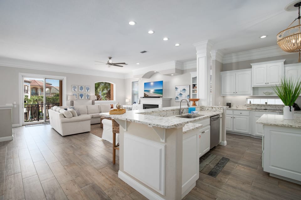 Your bright open-concept living space flows seamlessly from gourmet kitchen to cozy lounge, perfect for gathering and creating memories together.