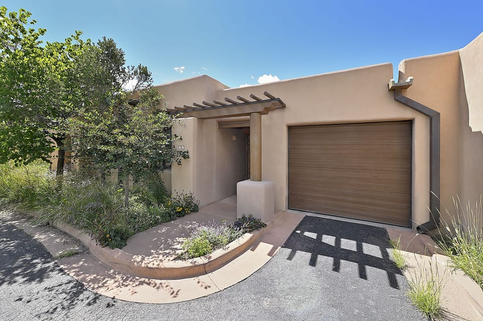 Garage may be used for parking - the driveway is too short for long term parking