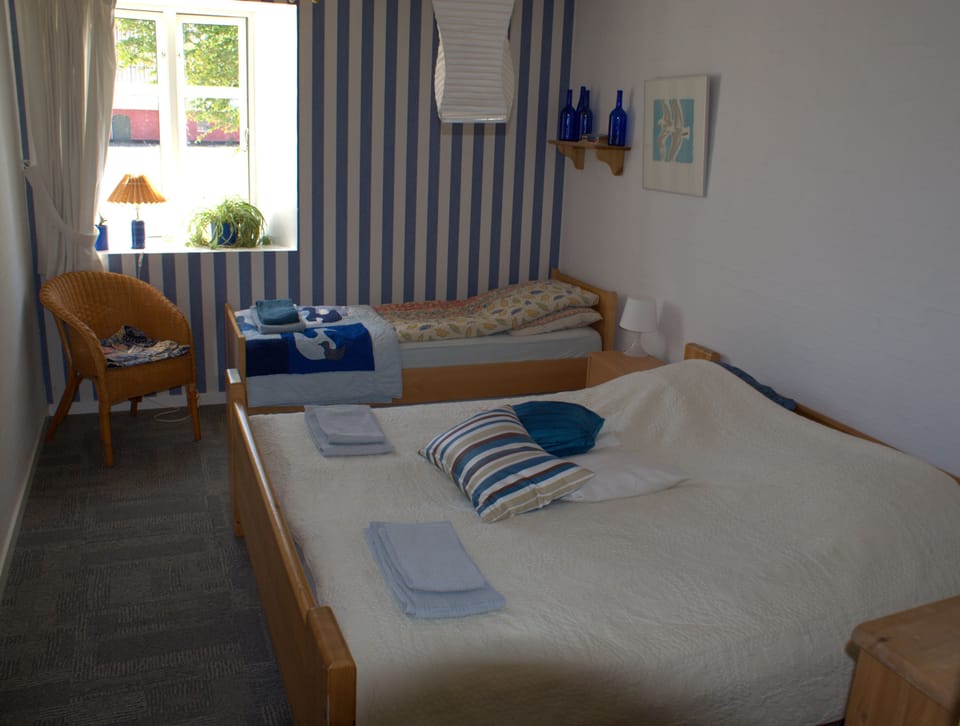 Triple Room, Non Smoking, Shared Bathroom | Blackout drapes, soundproofing, WiFi (free), individually decorated