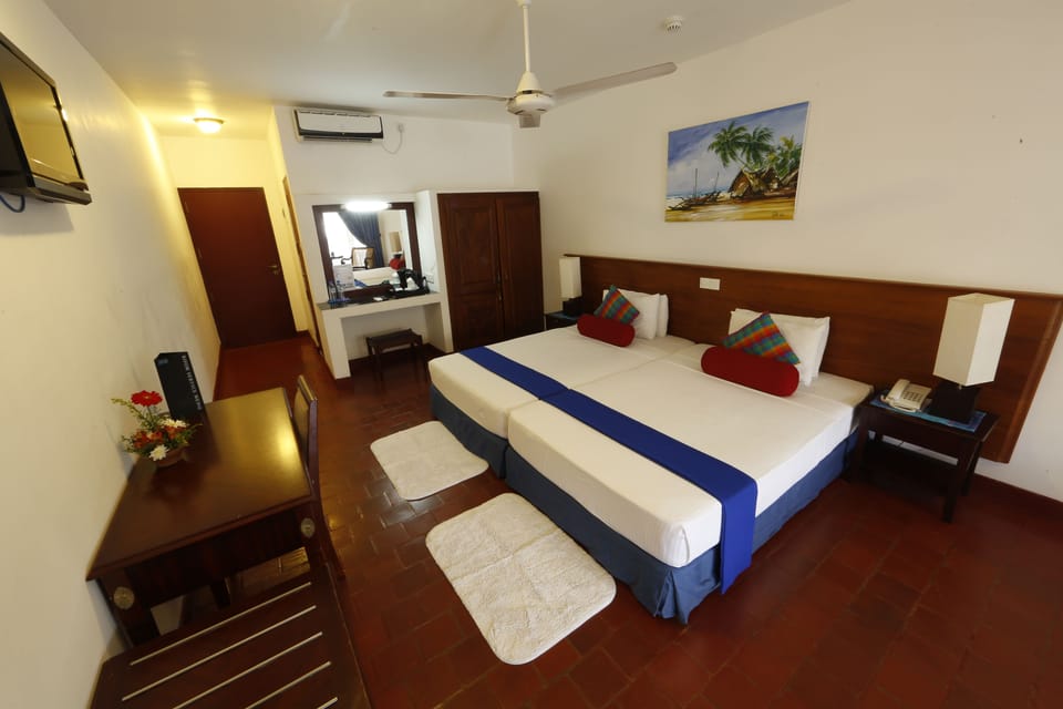 Standard Double Room, 1 Bedroom, Pool View | 1 bedroom, in-room safe, desk, iron/ironing board