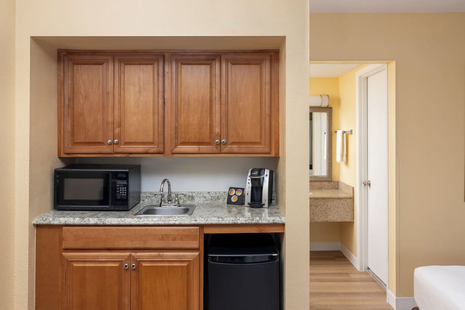 Studio Suite, 2 Double Beds, Pool View | Hypo-allergenic bedding, in-room safe, desk, blackout drapes