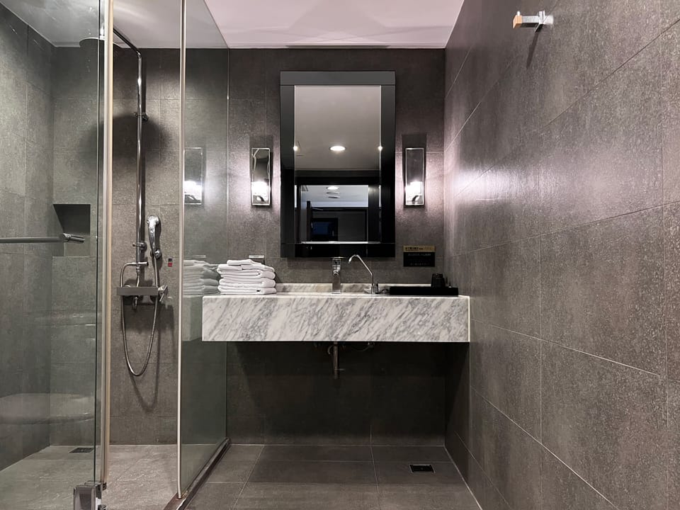Standard Triple Room | Bathroom | Separate tub and shower, deep soaking tub, rainfall showerhead, towels