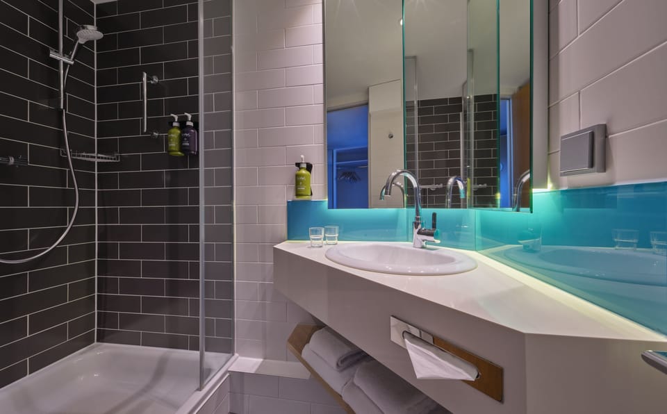 Shower, free toiletries, hair dryer, towels
