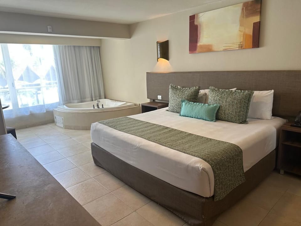 Family Suite, 2 Bedrooms | Minibar, in-room safe, laptop workspace, blackout drapes