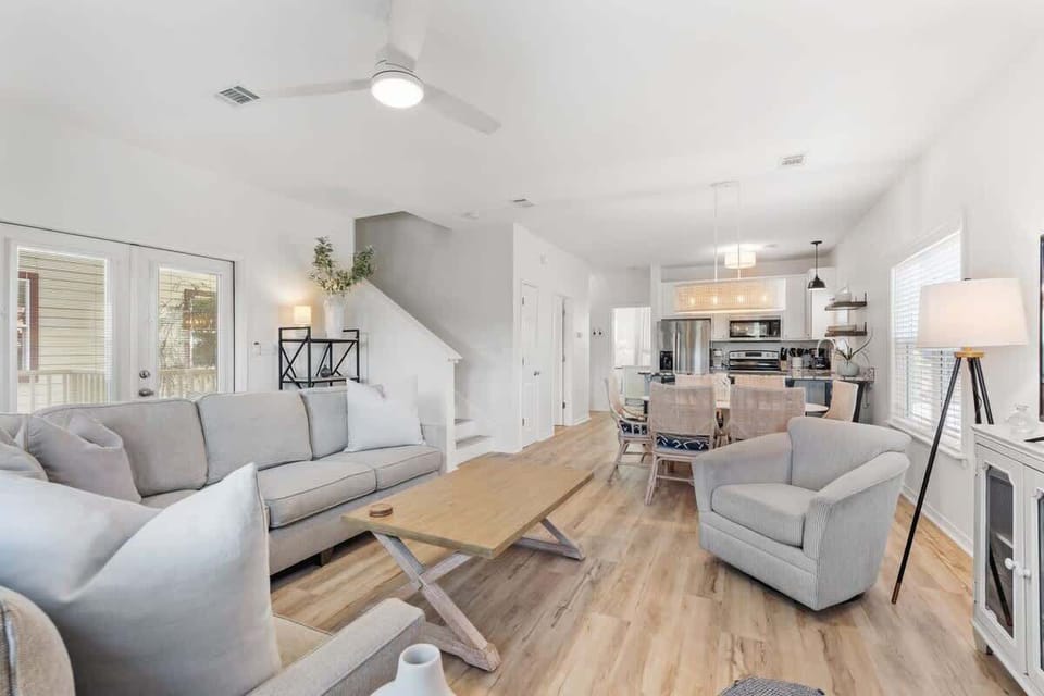 - Open layout blends cozy lounging, shared dining, & meal prep with ease - Natural wood floors, soft tones, & simple elegance make it feel like home the moment you arrive - Whether you're cooking, or catching up, this space brings everyone together