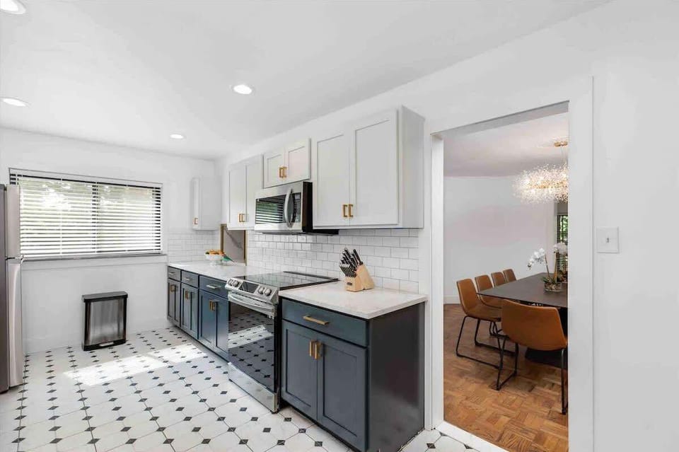 Spacious kitchen with open layout to dining room.
