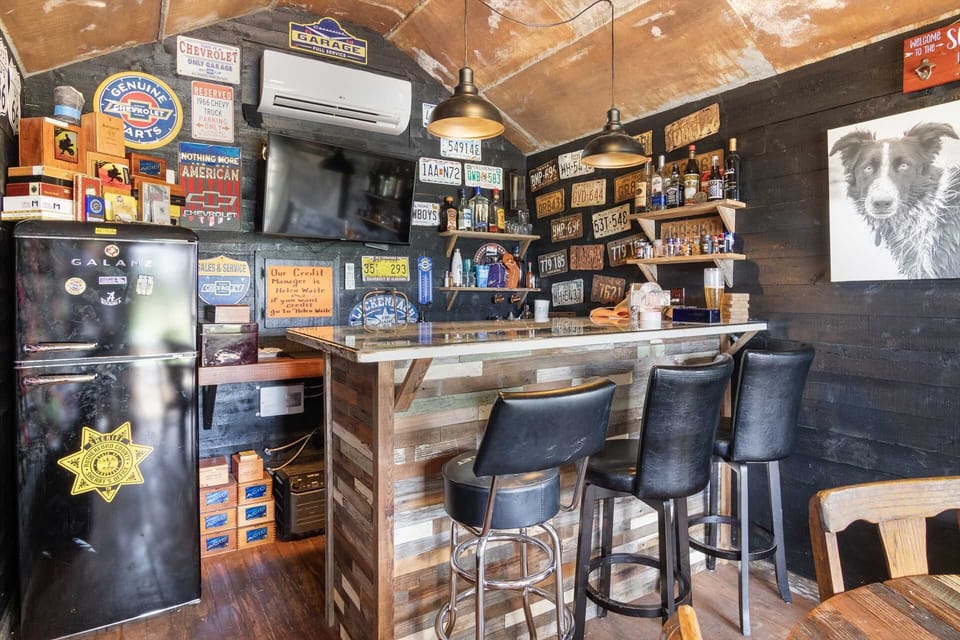 You'll find a fridge, card table, sink, TV, and bar seating in the Mirage's unique and fun bar!