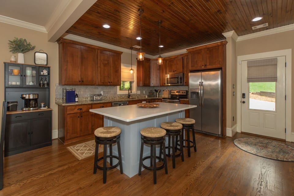 As soon as you step inside the front door, you'll find yourself greeted by a seamless transition into our stunning kitchen.