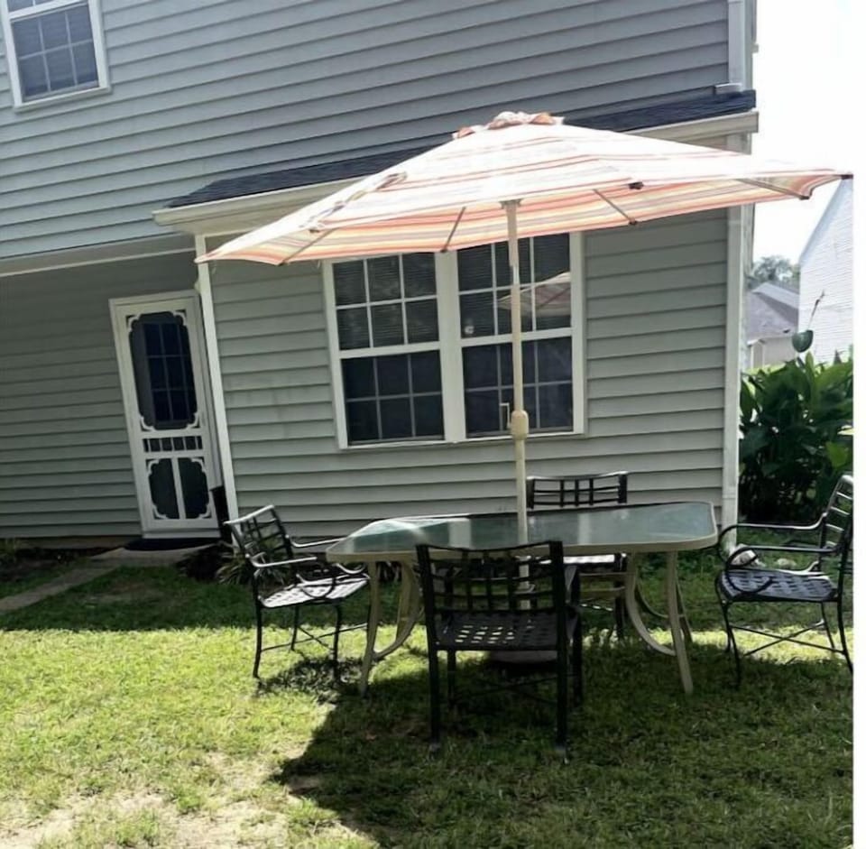 Back yard with Umbrella and table
