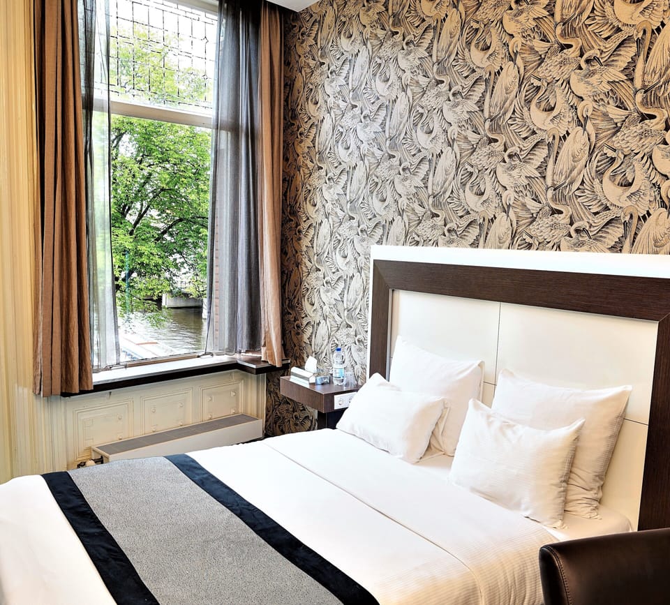Comfort Double or Twin Room, Canal View | Premium bedding, in-room safe, desk, iron/ironing board