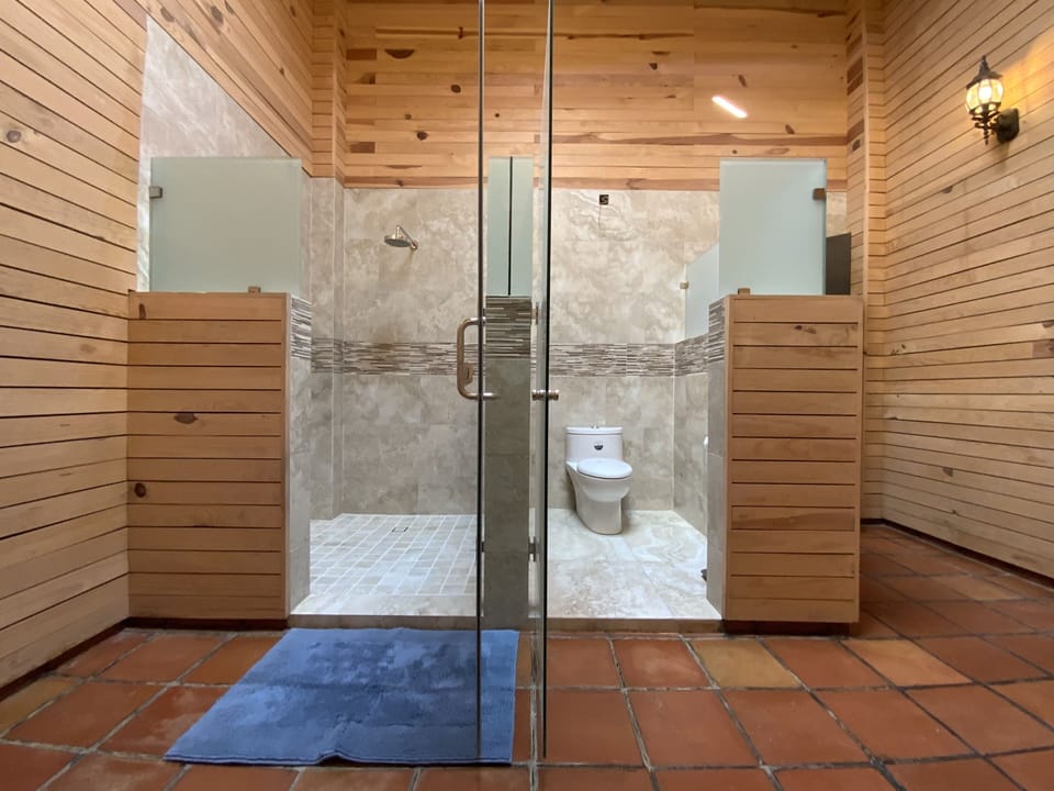 Suite Capricci, Garden and Pool View | Bathroom | Shower, hair dryer, bathrobes, towels