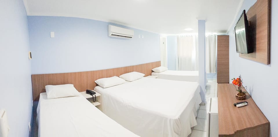 Quadruple Room (Suite) | Minibar, desk, laptop workspace, free WiFi