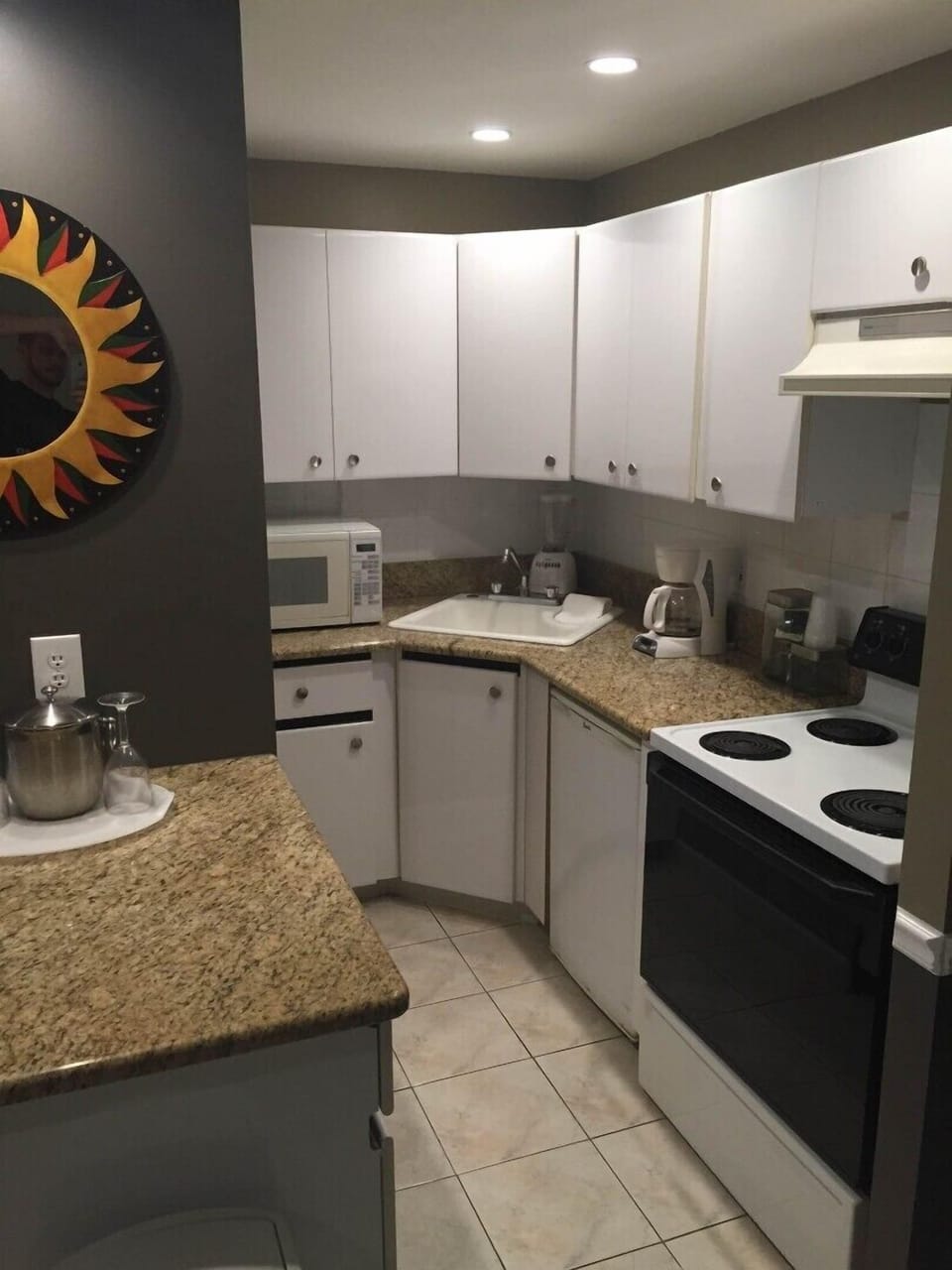 Deluxe Suite, 1 King Bed (Room 102) | Private kitchen | Fridge
