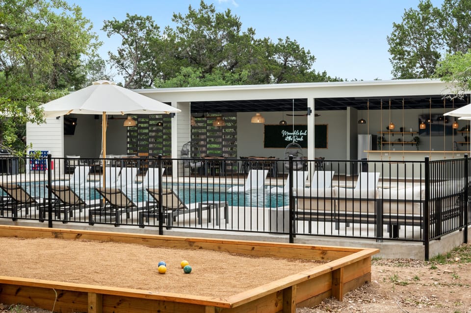 Outdoor pool, pool bar and bocce ball for you to enjoy during your stay.
