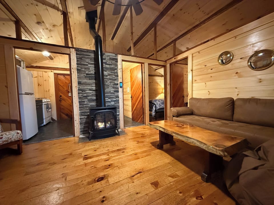 Living room, dining area, fireplace, bedrooms, bathroom and kitchen