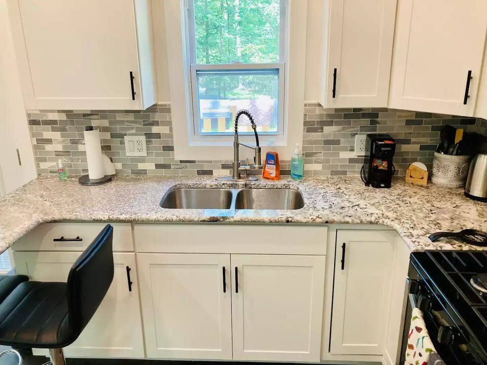 Fully equipped kitchen with coffee maker,coffee, creamer,tea and full gas stove