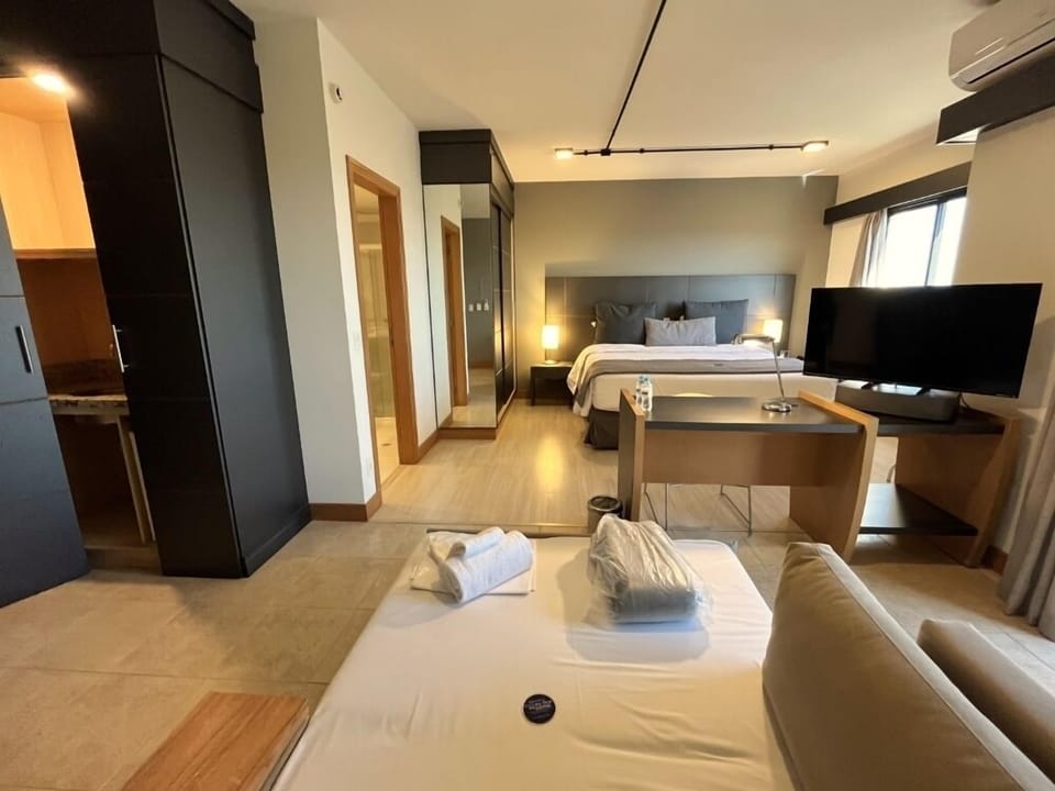 Family Suite | Minibar, in-room safe, desk, laptop workspace