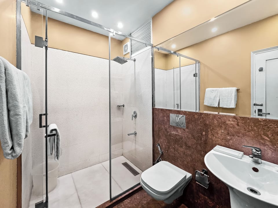 Family Room with Airport Pickup | Bathroom | Shower, rainfall showerhead, designer toiletries, hair dryer