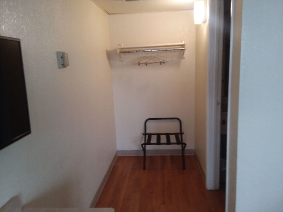 Desk, blackout drapes, bed sheets