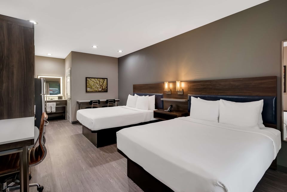 Suite, 2 Queen Beds, Non Smoking, Kitchenette | Hypo-allergenic bedding, desk, free WiFi, bed sheets