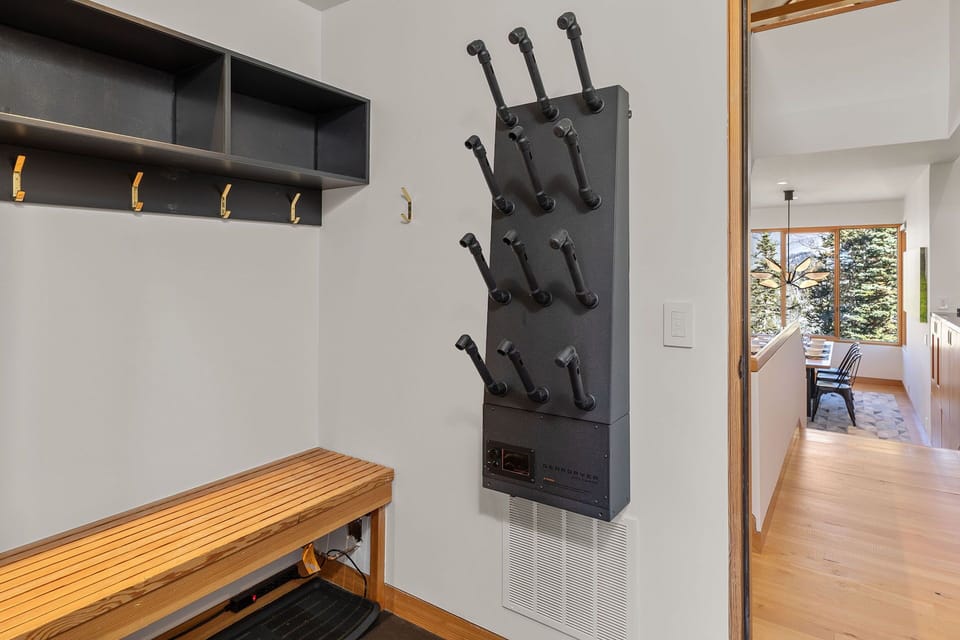 This foyer, off the kitchen, is great for getting dressed for a day of skiing with a boot warmer provided to dry your boots before you head out.