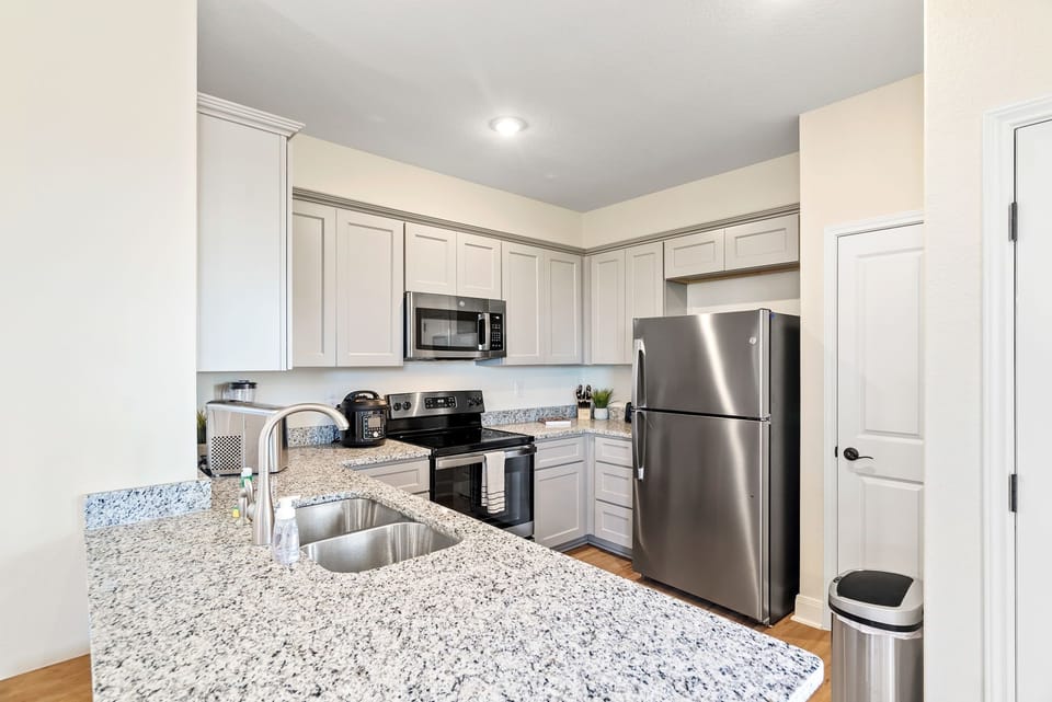 Plenty of workspace on the new granite countertops.