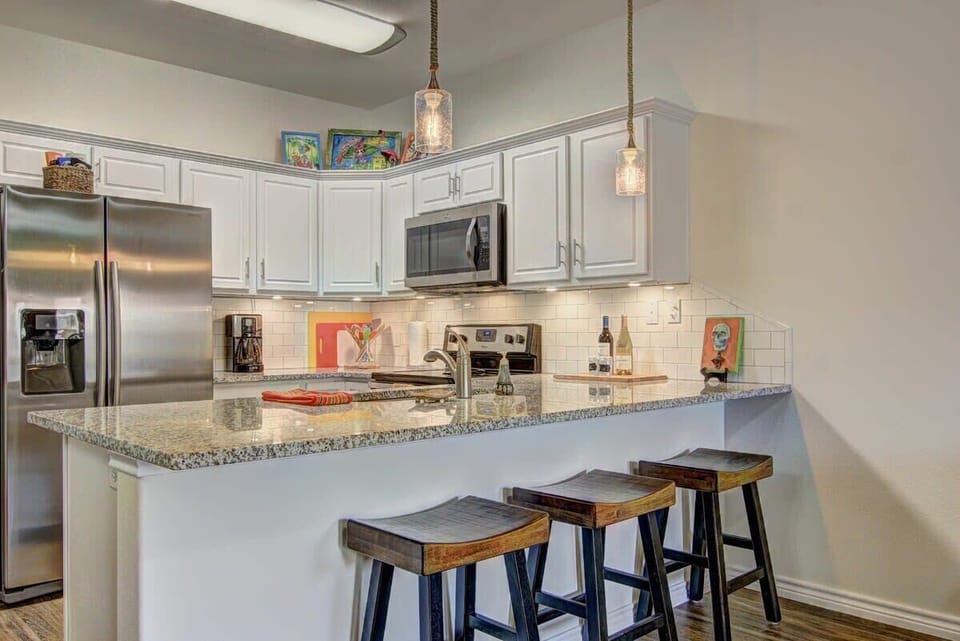 Prepare culinary delights with ease in our fully stocked kitchen—where every ingredient for a perfect meal awaits.