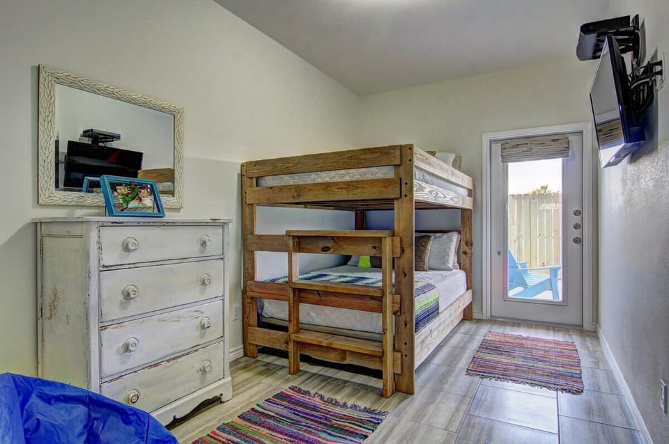 Our bunk room features a full over full bed with a trundle, perfect for cozy sleepovers and memorable adventures.