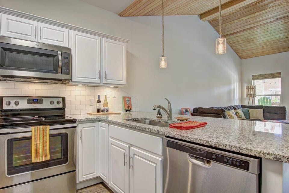 Prepare culinary delights with ease in our fully stocked kitchen—where every ingredient for a perfect meal awaits.