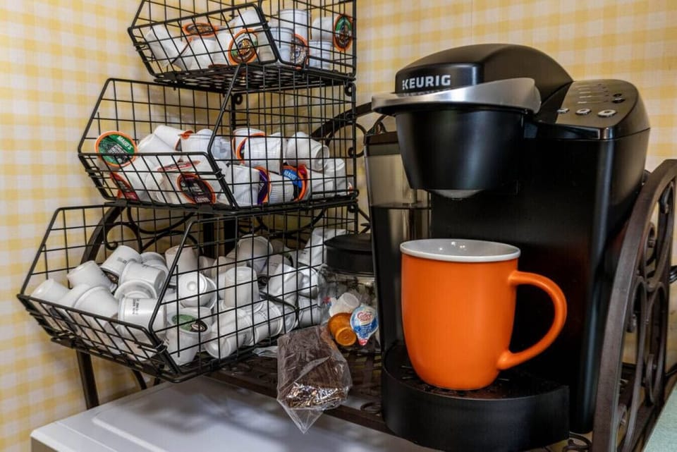 Keurig Coffee Machine w/ Pods provided.