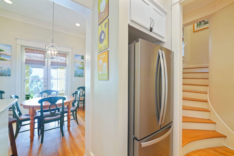 LARGE STAINLESS STEEL FRIDGE IN KITCHEN