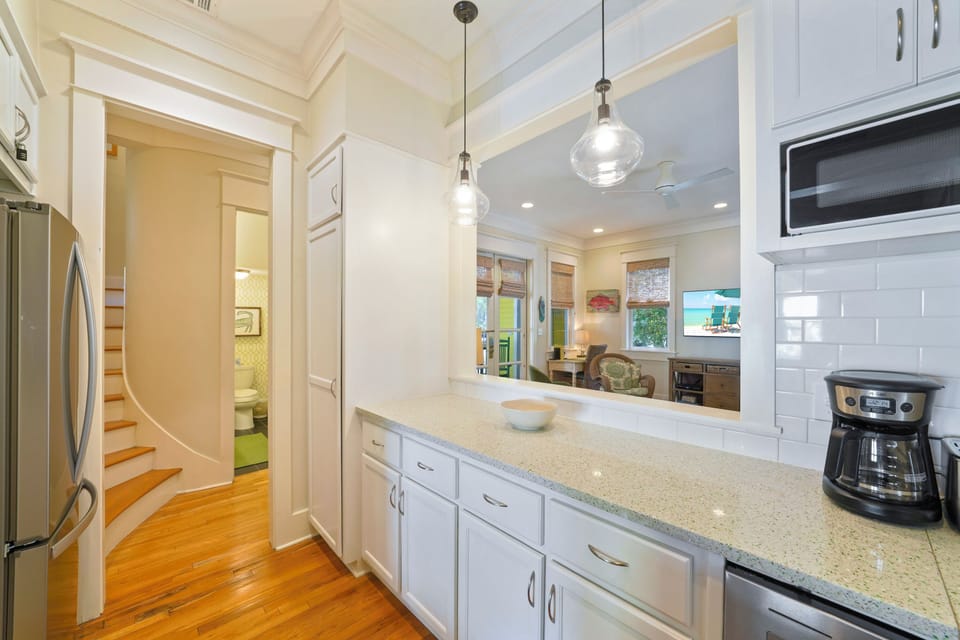 PLENTY OF BUILT IN CUSTOM CABINETS & STORAGE
