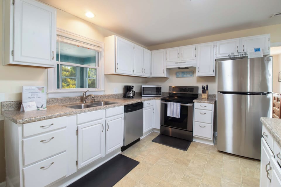 Your fully equipped kitchen features granite countertops, stainless steel appliances, and everything you need to prepare your favorite meals during your stay.