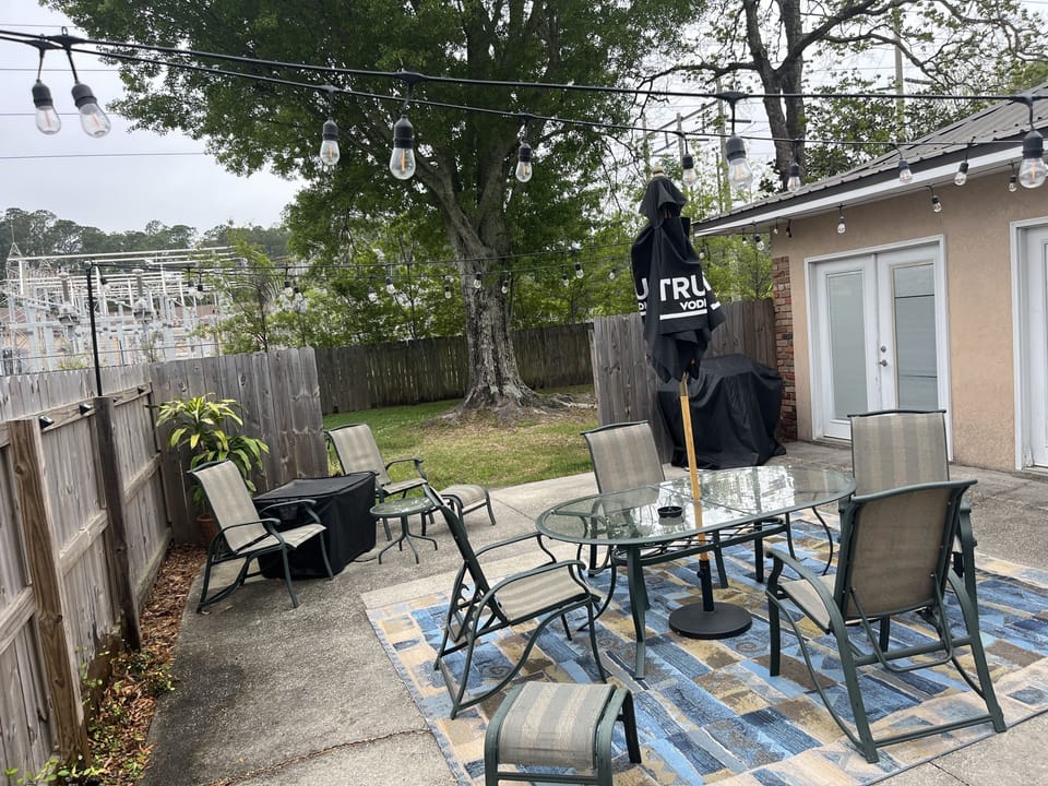 Outdoor Patio with gas fire pit and gas grill.