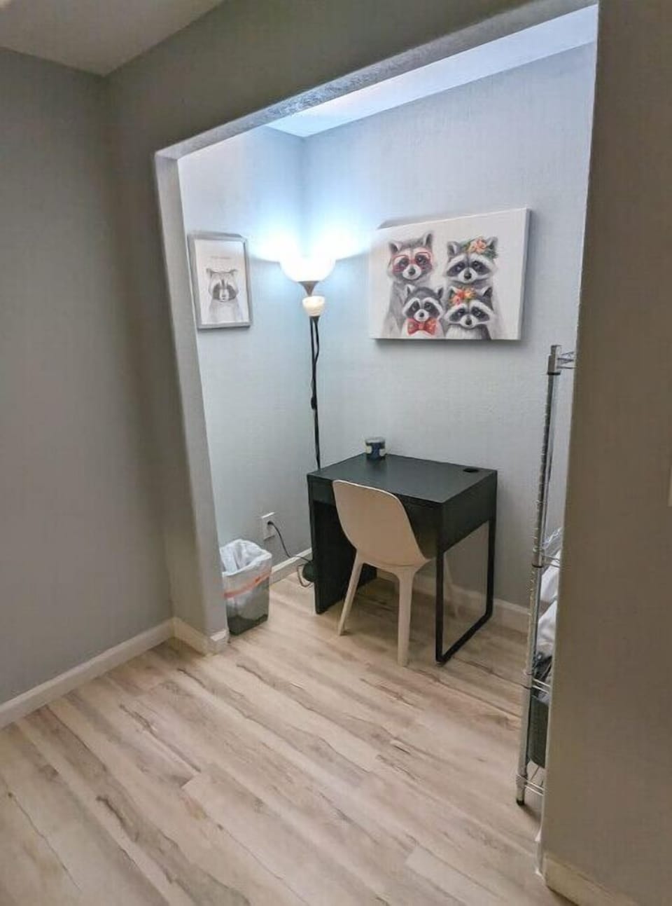 work space with ample lighting and desk