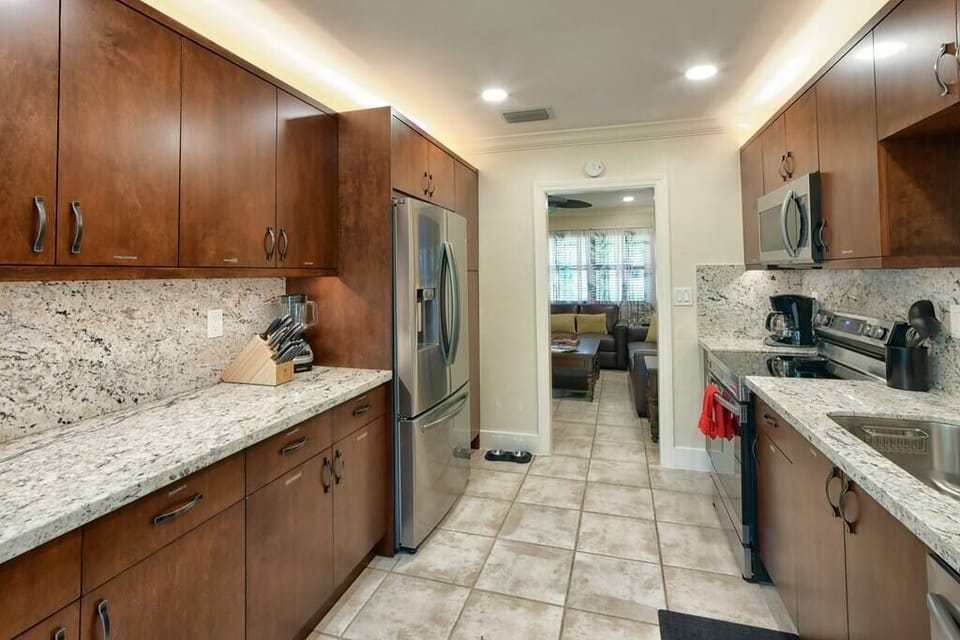 Kitchen is easy access to the front Living Room. 