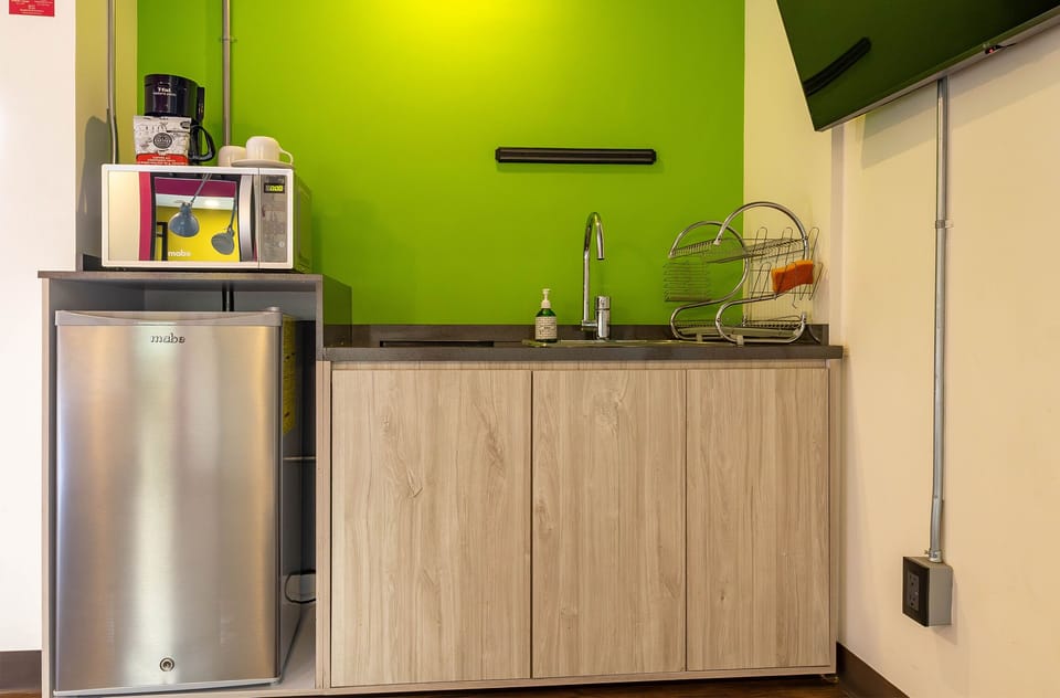 Suite, 1 Queen Bed, Non Smoking | Private kitchen | Mini-fridge, microwave, cookware/dishes/utensils