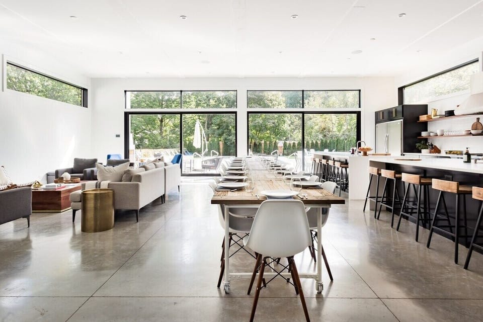 23 Ft Dining Table w/ 24 chairs. Kitchen Islands can also seat 10 more people!
