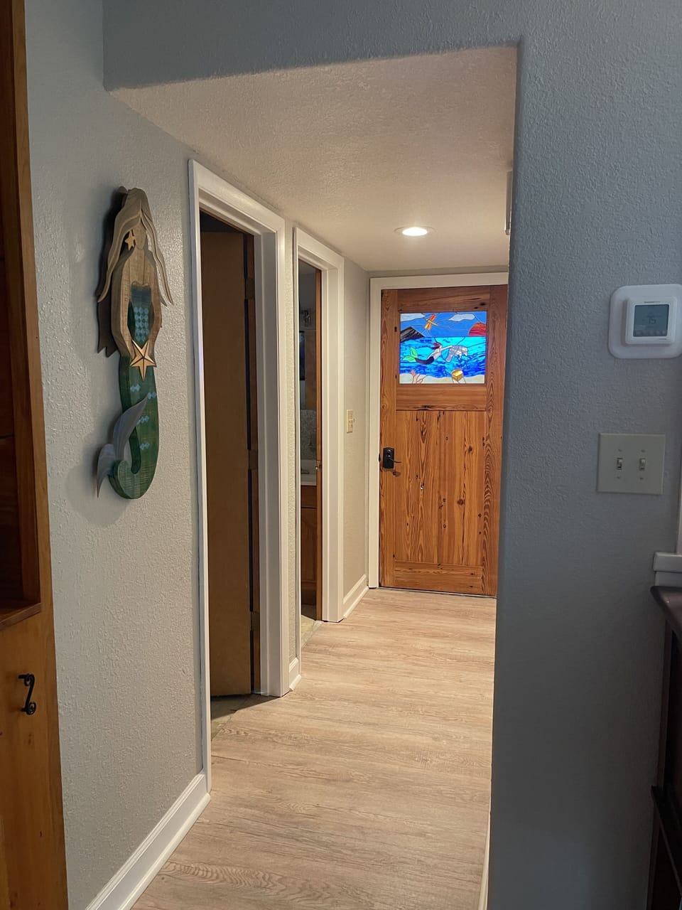 Front door & 1/2 bath