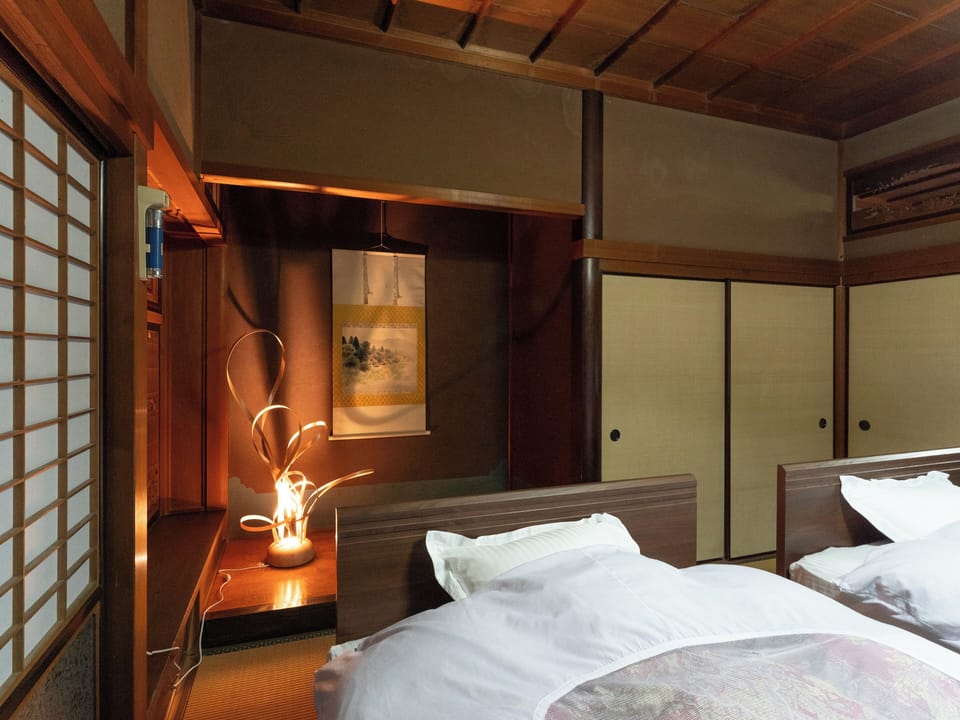 Deluxe Quadruple Room | Desk, WiFi (free), bed sheets