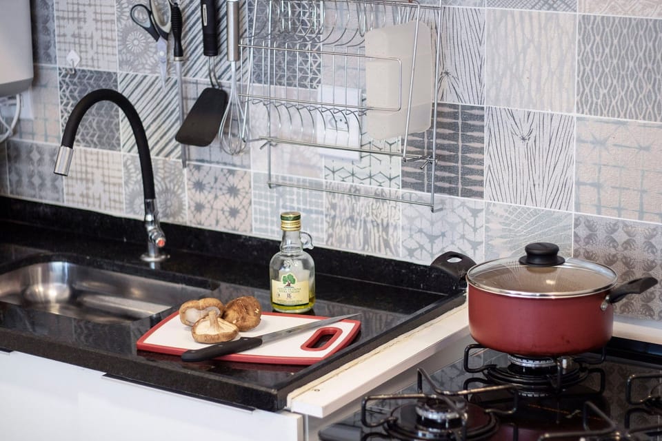 Villa | Private kitchen | Fridge, microwave, oven, blender